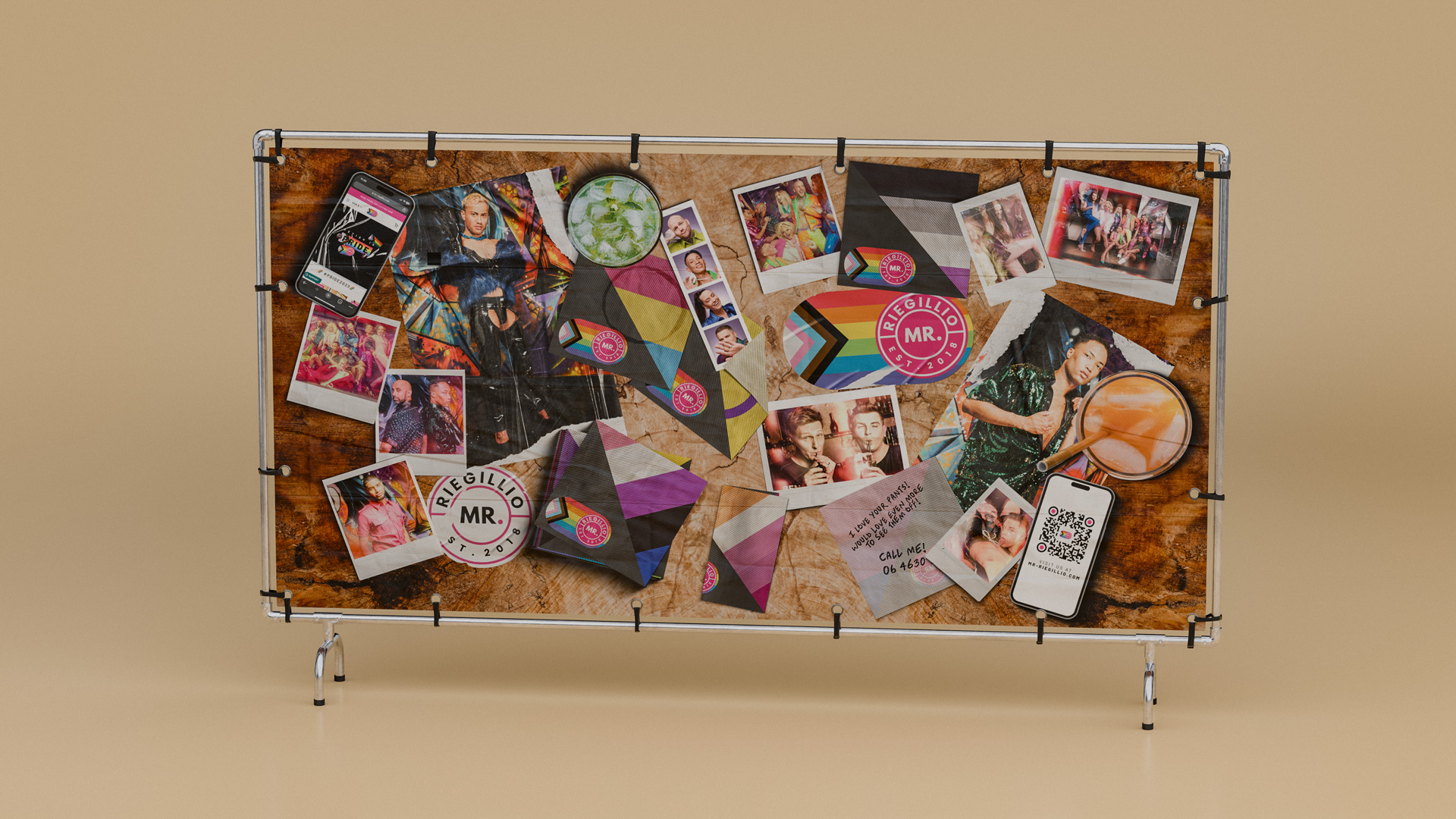 Wooden board on metal stand displaying photos, Riegillio MR. stickers, colorful patterned cloth pieces, a drink with ice, and a phone with a QR code.