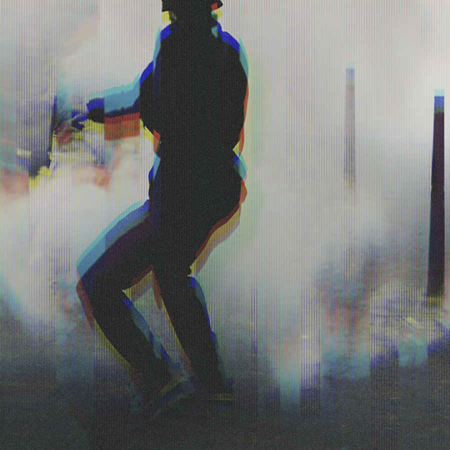 Silhouette of a person in dark clothing surrounded by colorful smoke with a glitch effect.