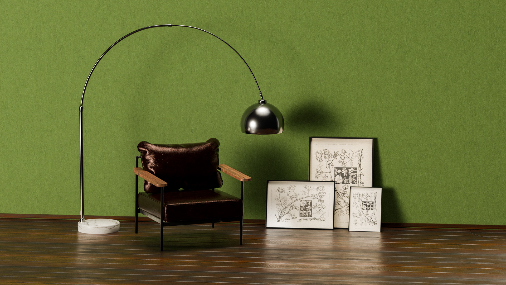 Modern black leather armchair with wooden armrests under a curved floor lamp next to three framed botanical sketches on a wooden floor with a green wall background.