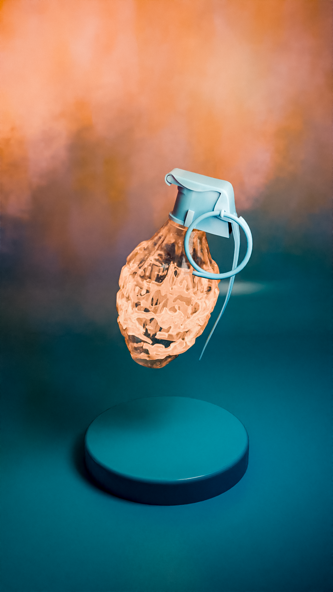 Blue grenade with a textured, translucent body and a large safety pin, displayed above a round blue pedestal against an orange and teal gradient background.