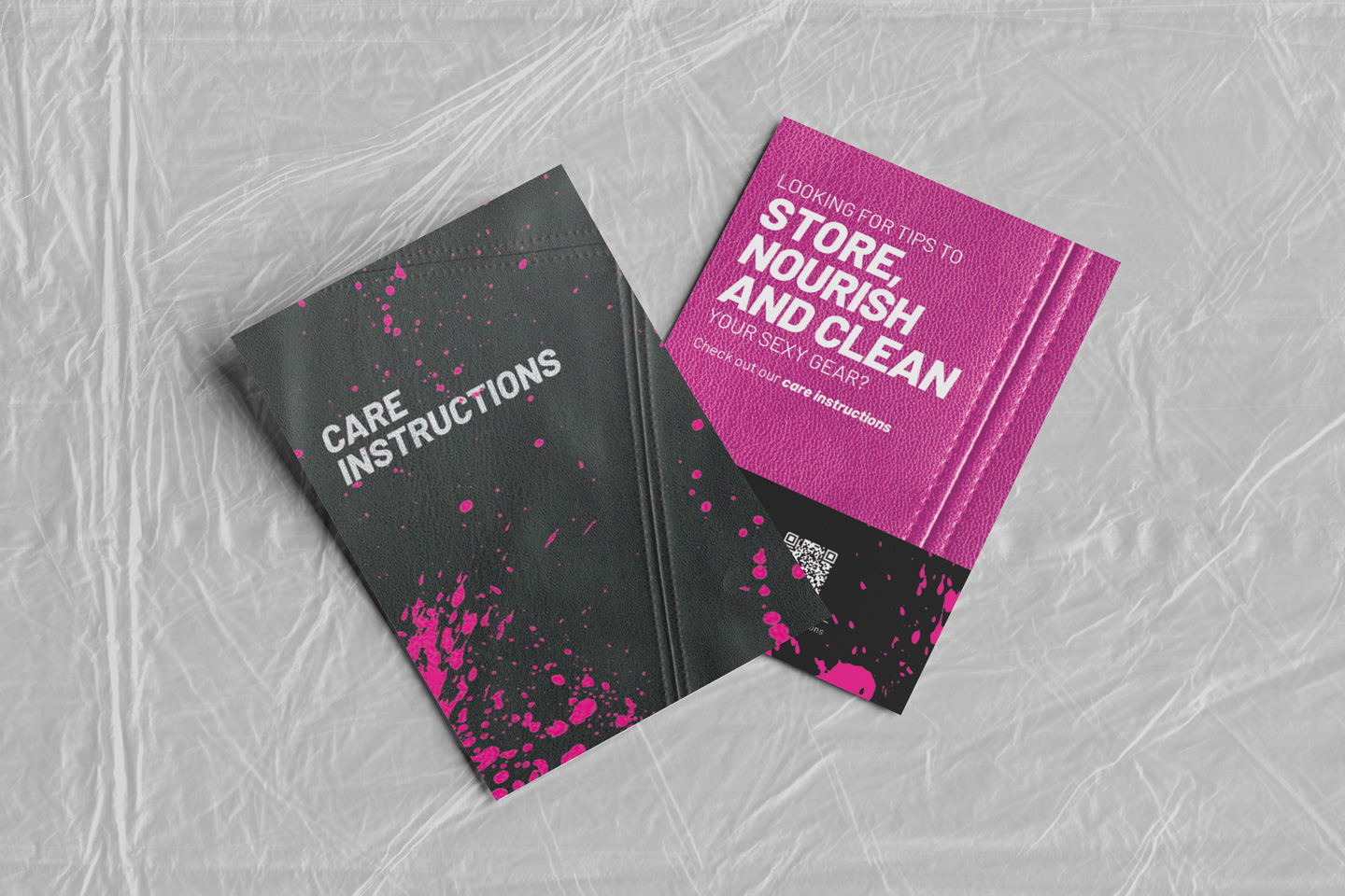 Two care instruction booklets, one black with pink splatters and the text Care Instructions, the other pink with white text about storing, nourishing, and cleaning gear.