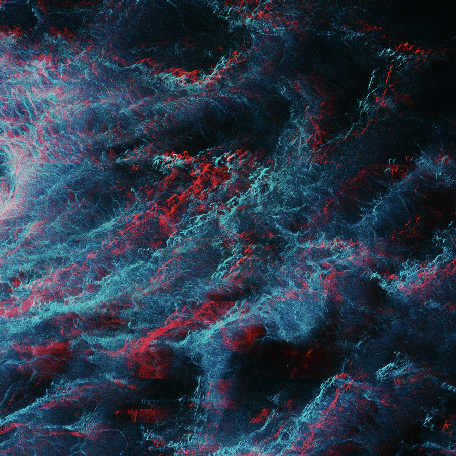 Abstract close-up of ocean waves with blue and red lighting effects.