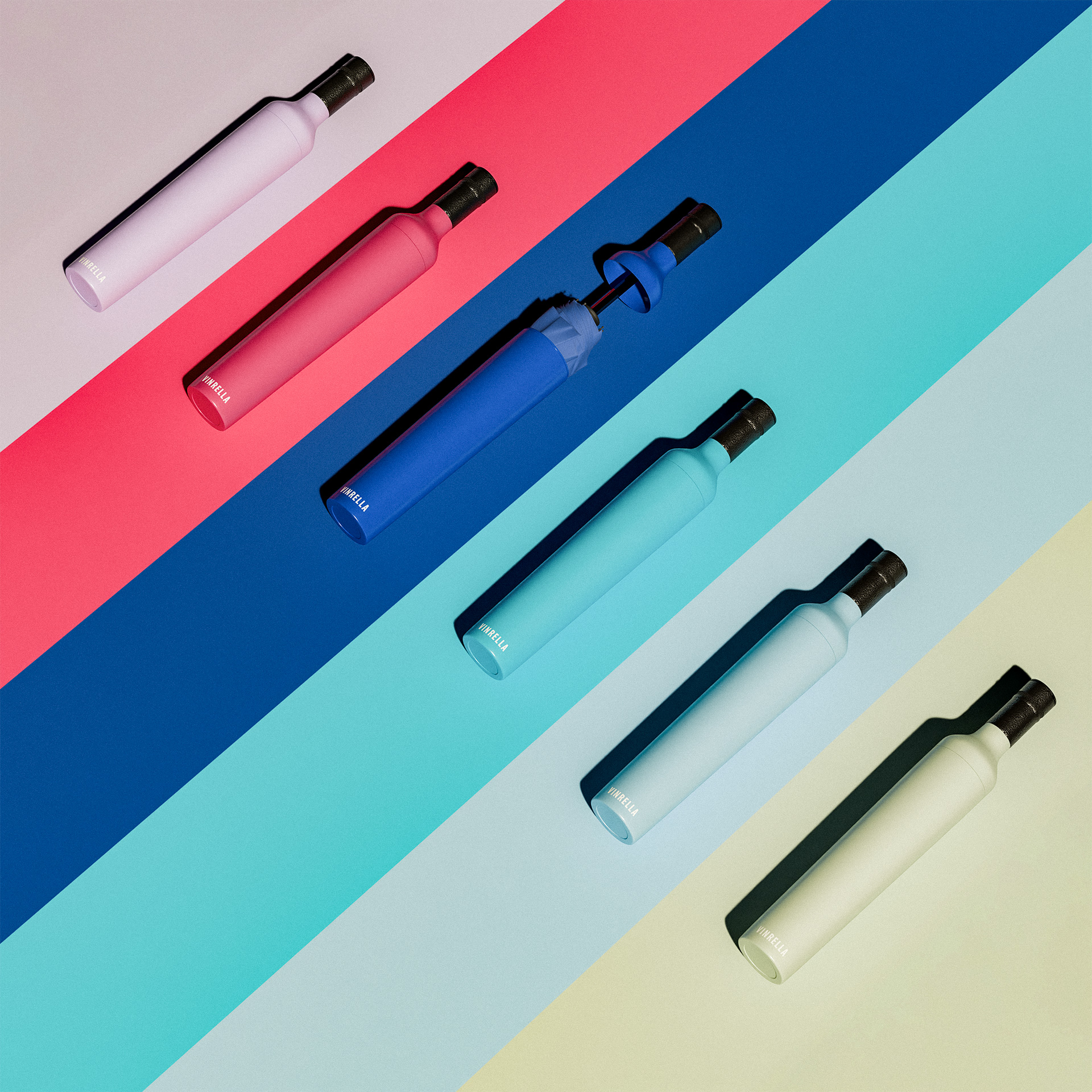 Six colorful umbrella bottles arranged diagonally on a striped background, one umbrella partially opened.